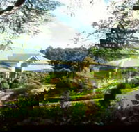 The Falls Rainforest Cottages - Whitsundays Accommodation