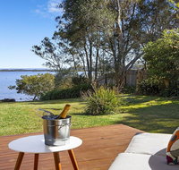 Braeside - waterfront fireplace - Whitsundays Accommodation