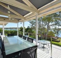 Morisset Bay Waterfront Views Lake House looking over Trinity Marina - Whitsundays Accommodation