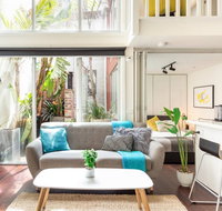 Trendy Loft Near Smith St. with Cosy Courtyard and Parking - Whitsundays Accommodation