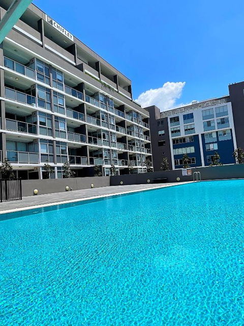 AQUA 306 POOLSIDE Luxury Apartment , Honeysuckle, NEWCASTLE FREE Parking - Whitsundays Accommodation 0