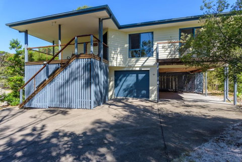 12 Ibis Court - Highset Beach House With Natural Bushland Gardens And Covered Decks - Whitsundays Accommodation 1