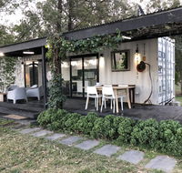 Absolute riverfront shipping container cabin - Whitsundays Accommodation