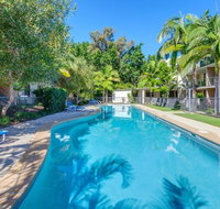 Baden 70 - Rainbow Shores Ground Floor Air Con Overlooking lap pool - Whitsundays Accommodation